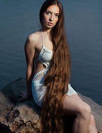 Nude teenage models with very long hair
